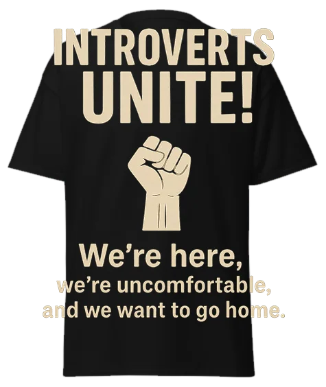 Black unisex t-shirt with off-white "INTROVERTS UNITE!" text, raised fist graphic, and "We're here, we're uncomfortable, and we want to go home." – funny sarcastic graphic tee